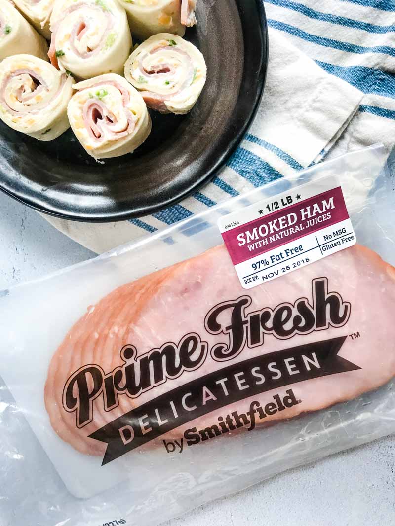 Easy Ham Roll Ups are a quick and easy appetizer that is perfect for tailgating, parties and even the kiddos lunches!