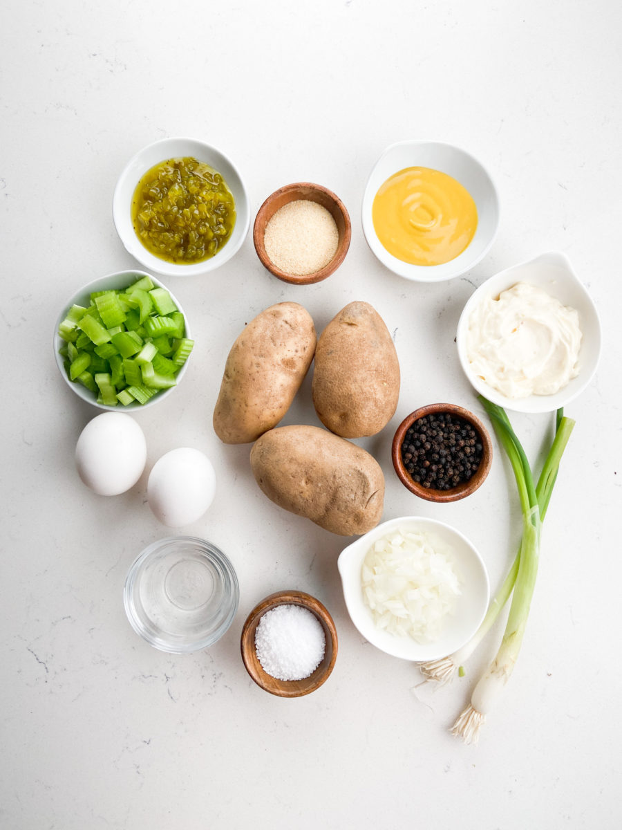 Potato salad ingredients on white background. 