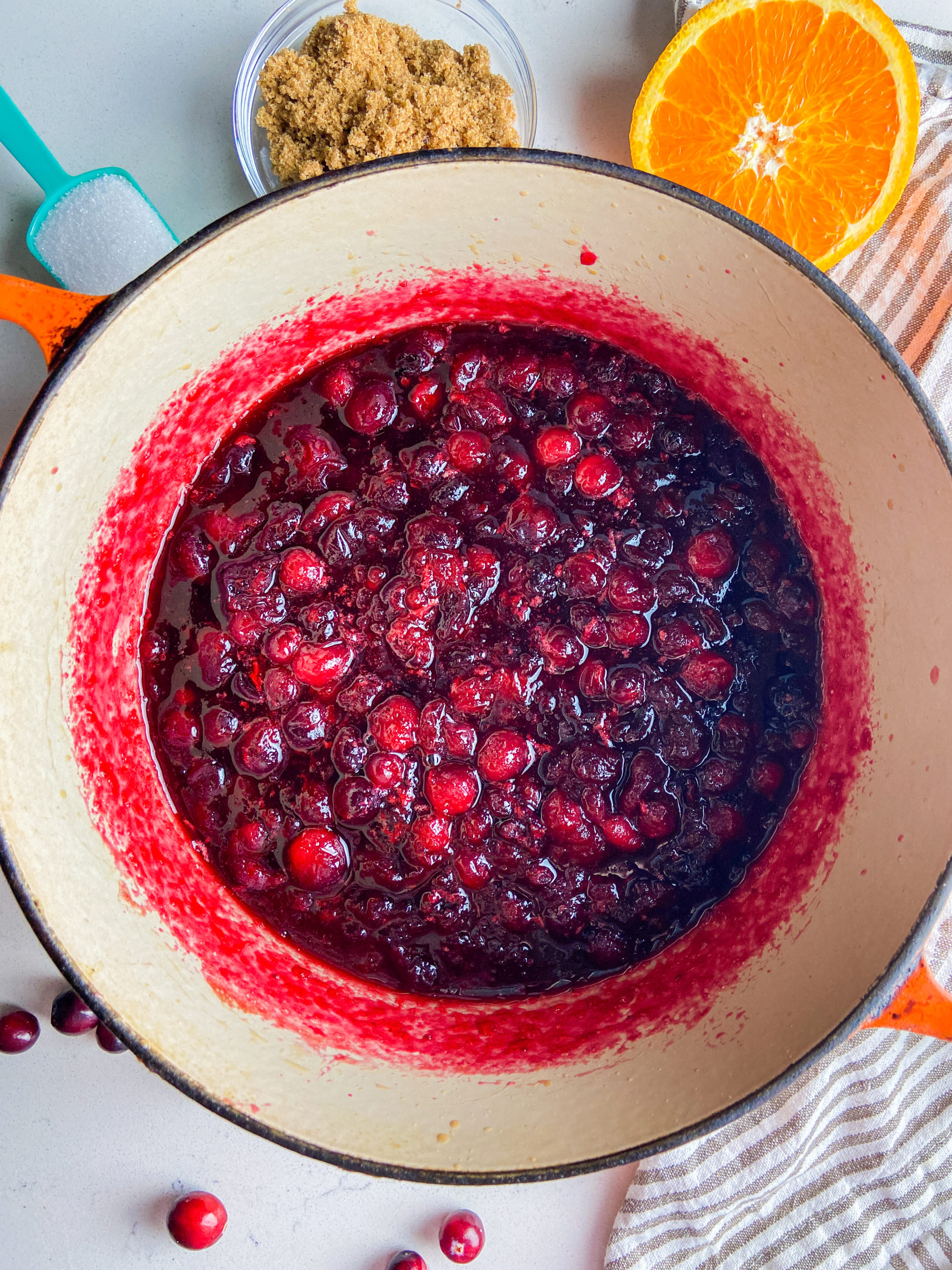 Overhead photo of cranberry sauce in a pot. 