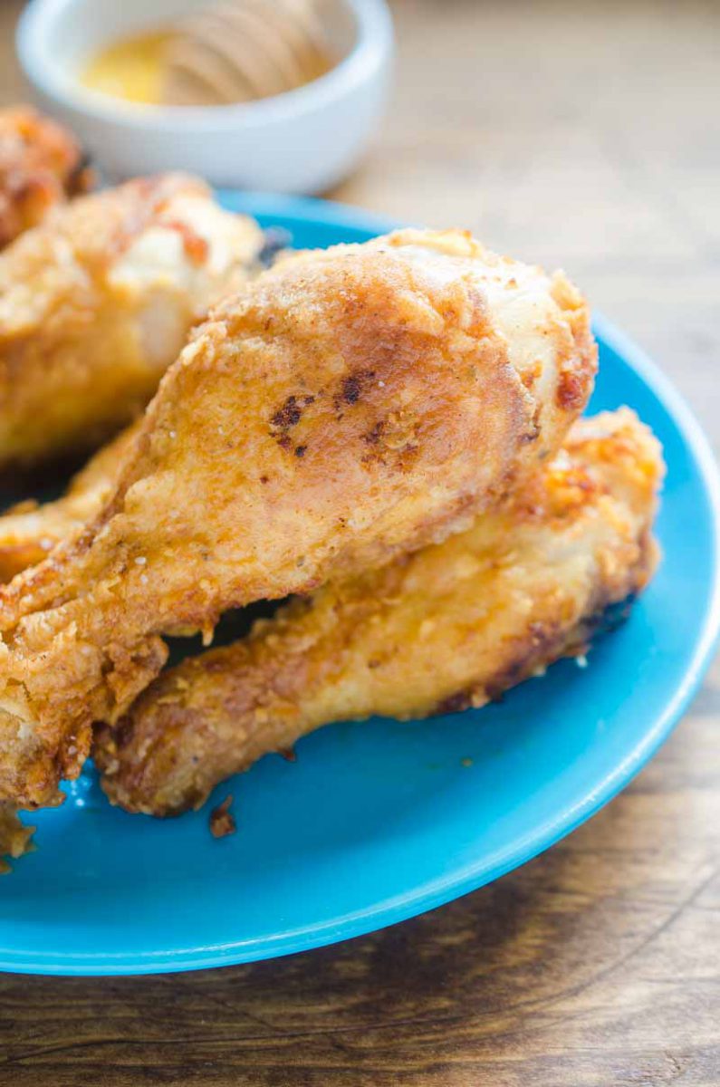 Honey Fried Chicken is a twist on everyone's favorite Southern Fried Chicken. A drizzle of honey is the perfect touch to crispy fried chicken.