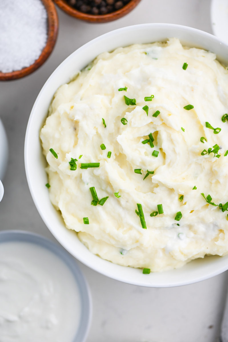 Horseradish mashed potatoes in a white bowl.