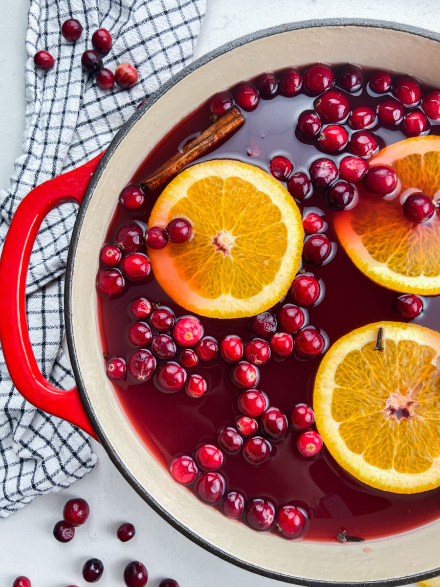 Hot cranberry apple cider in a pot. 