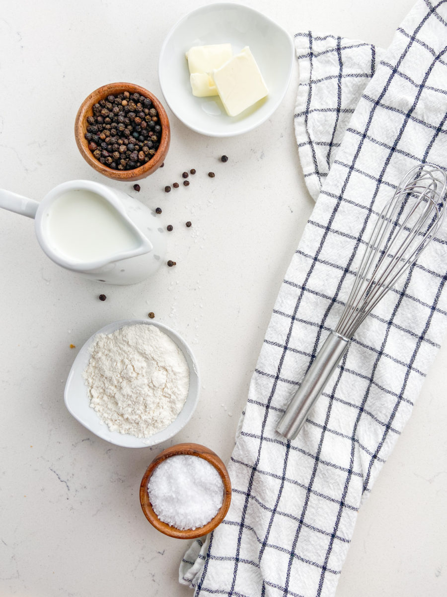 Overhead photo  of ingredients  for white country gravy. 