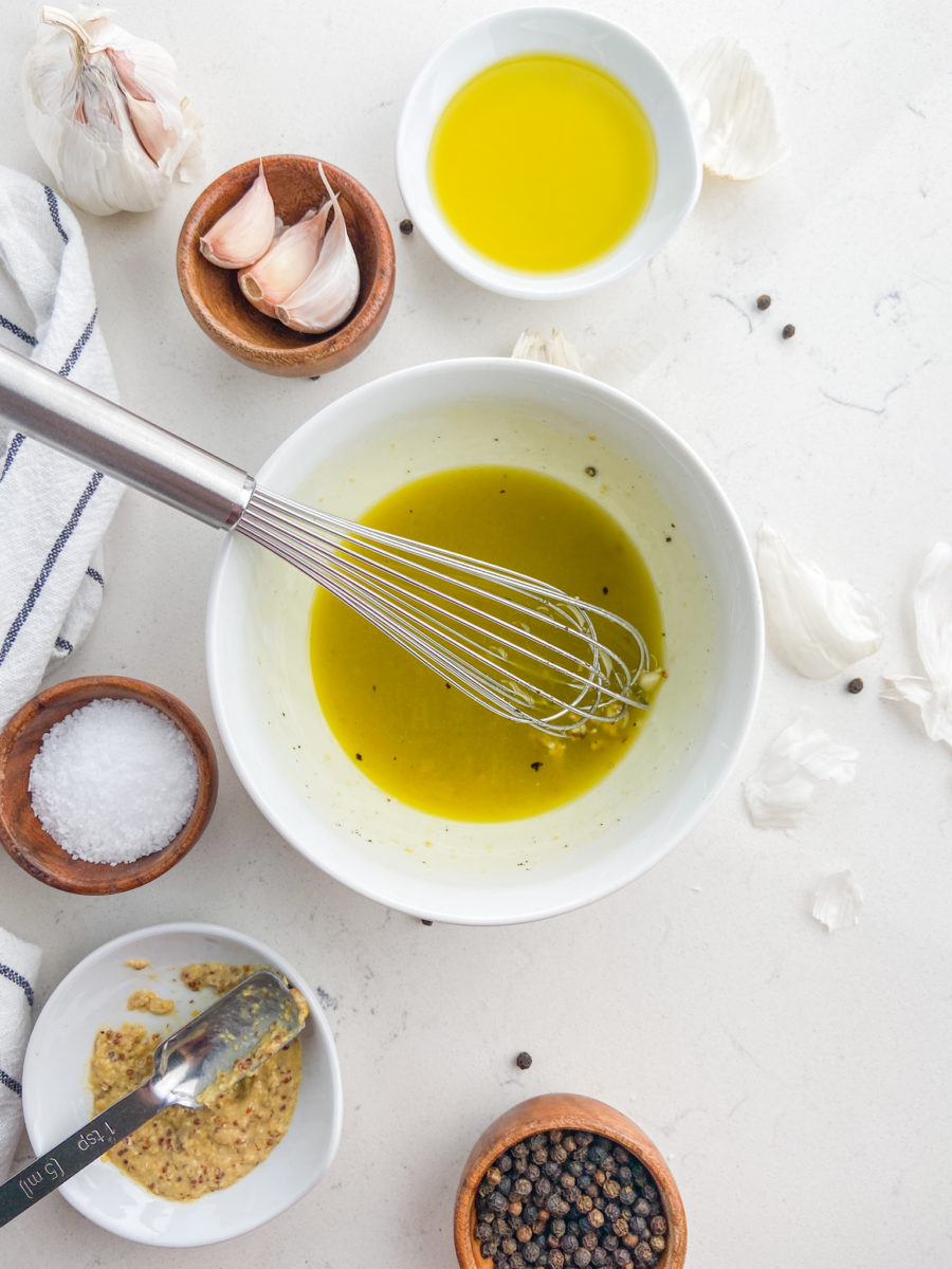 Overhead photo of making garlic vinaigrette.