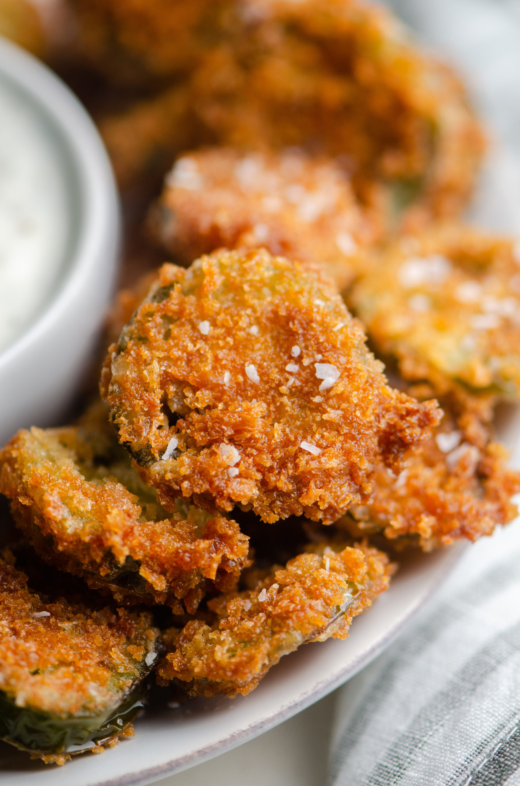 Side close up photo of fried jalapeno bites. 