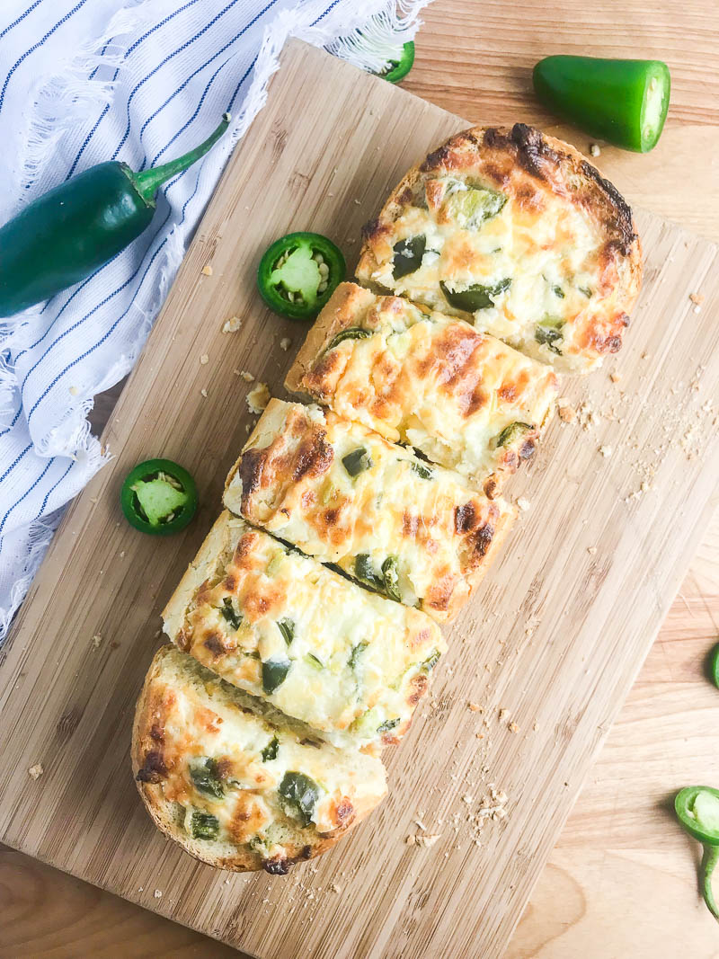Jalapeno popper bread on cutting board. 