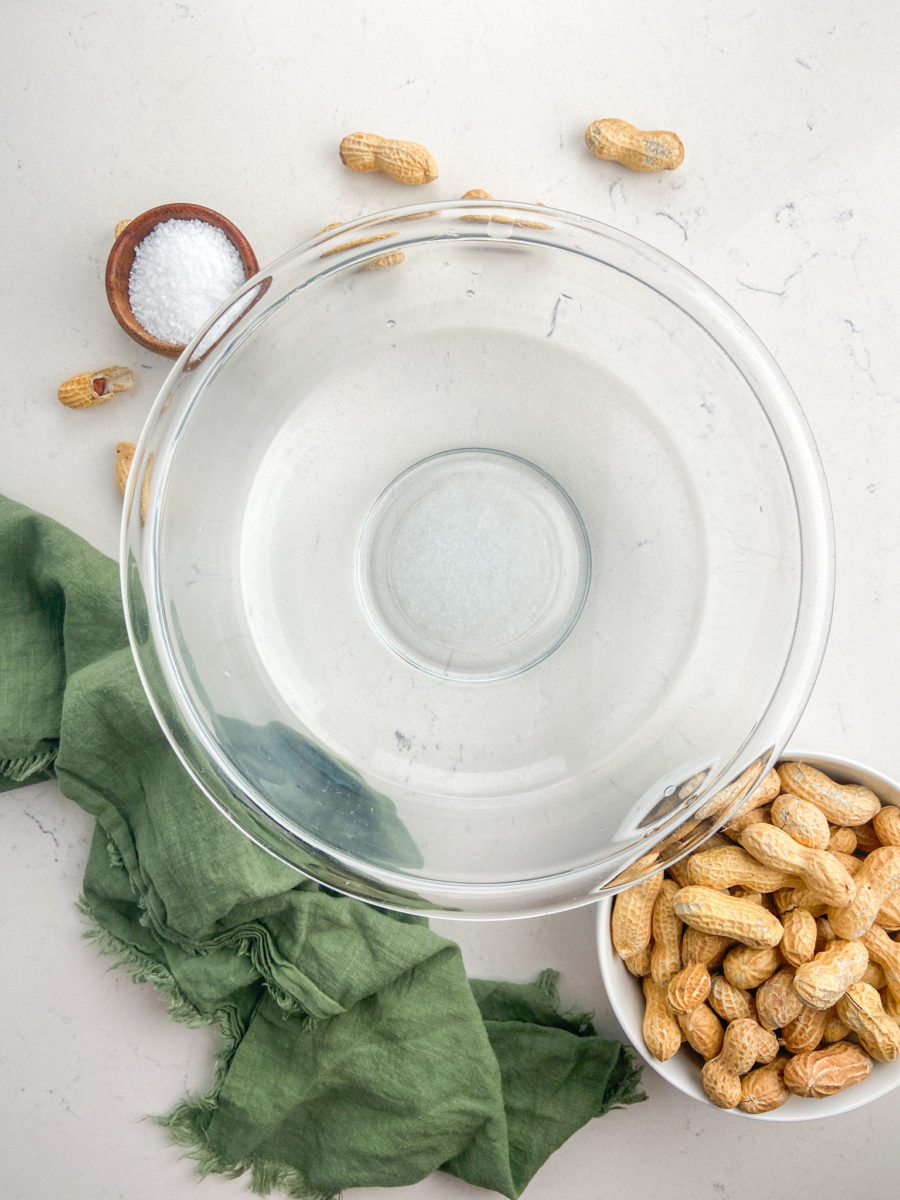 Glass bowl filled with salted water. 