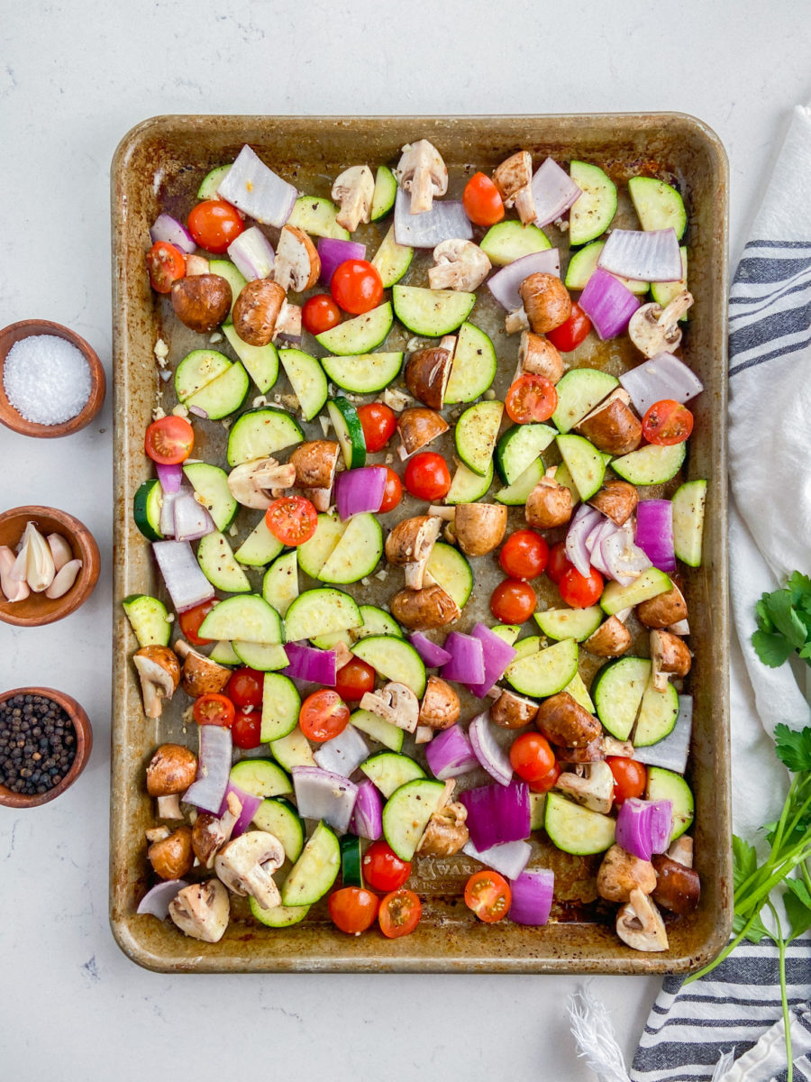 Raw vegetables on baking dish. 