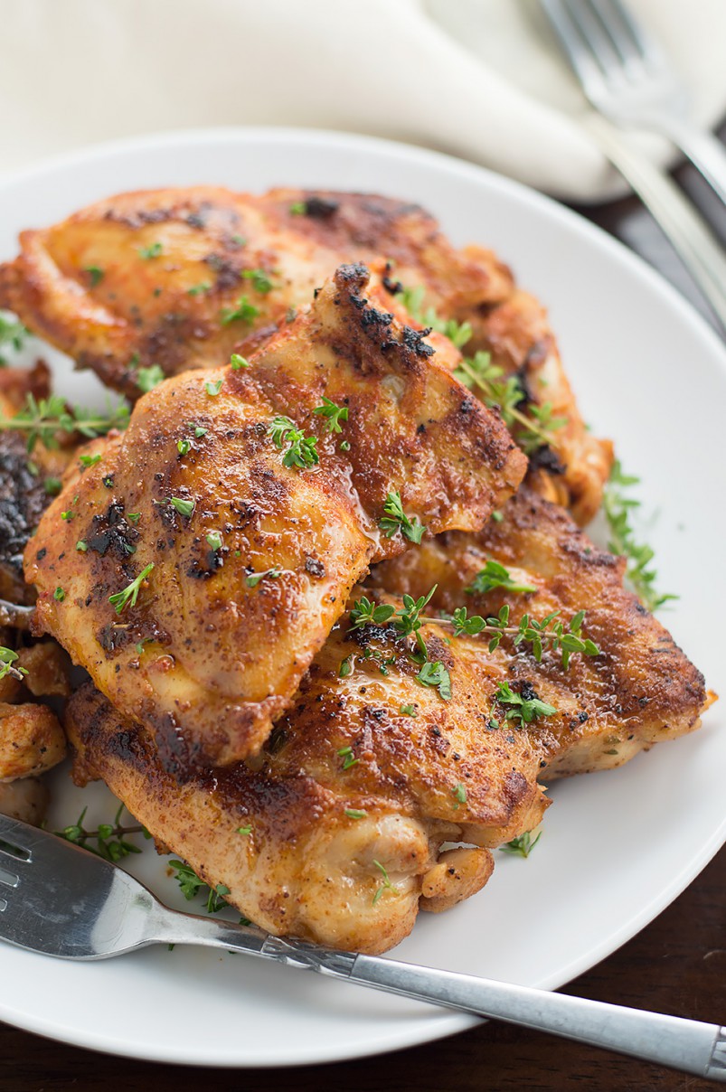 Smoky and Juicy Paprika Grilled Chicken. Juicy chicken thighs marinated with garlic, paprika, thyme and lemon then grilled to perfection.