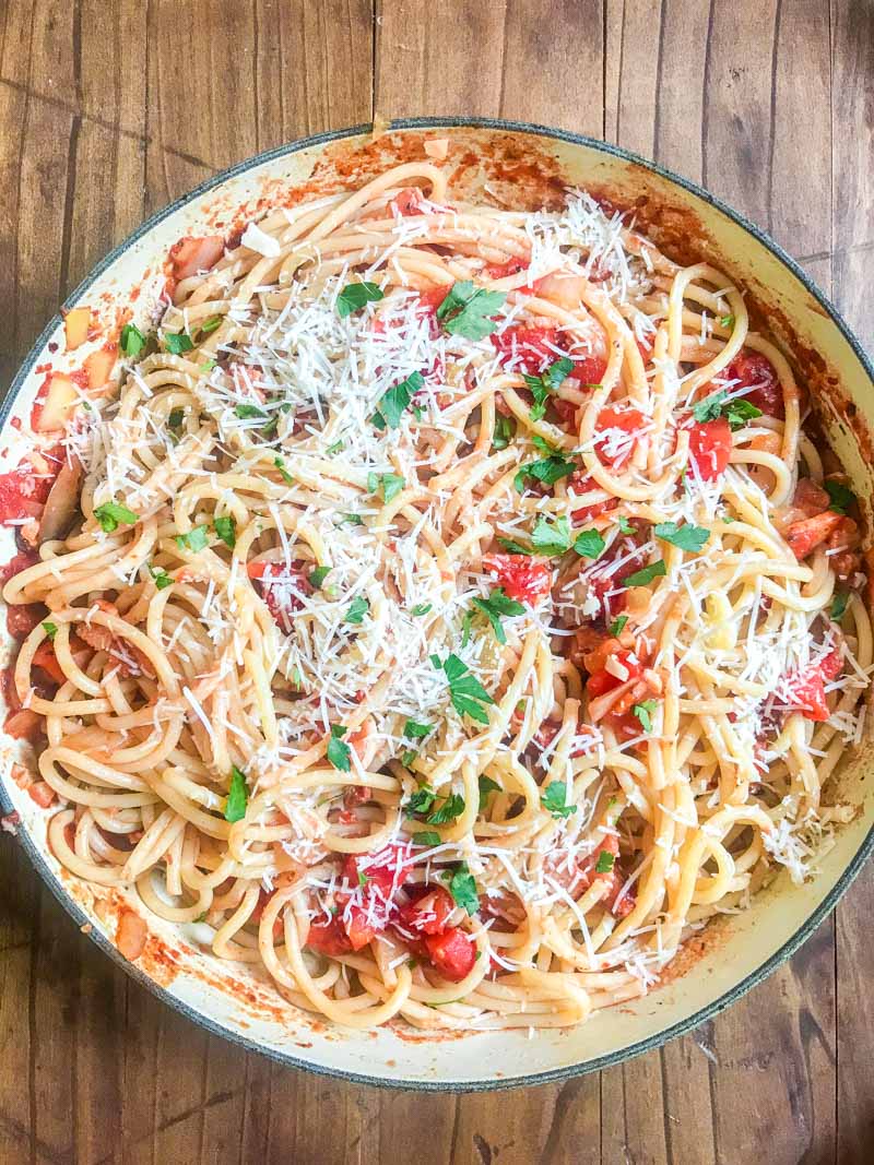 Pasta Amatriciana made with pancetta, tomatoes, Romano cheese, crushed peppers and onions. It will be a family favorite!  #amatriciana #pasta