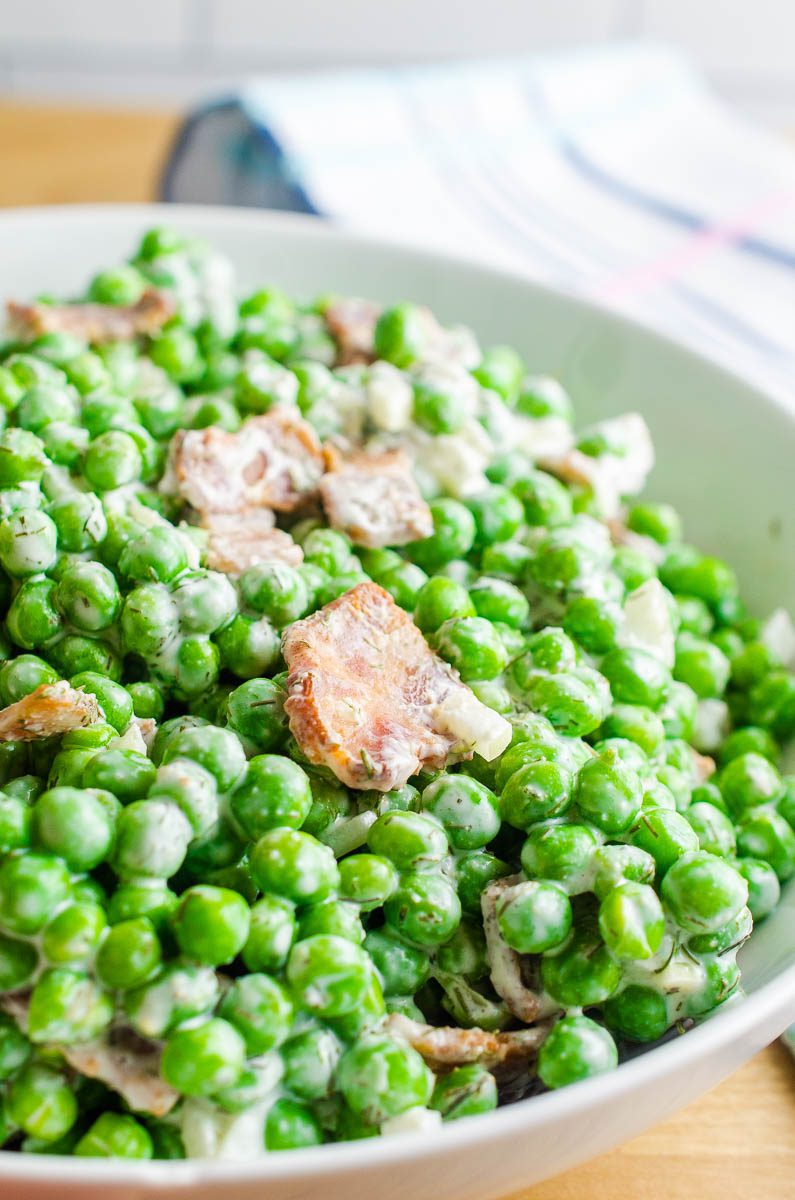 Pea Salad with Bacon is a classic for a reason. This version is lightened up with greek yogurt and is perfect for spring picnics and summer BBQs. 