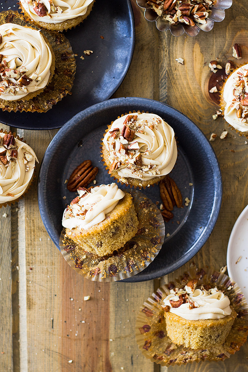 These Pecan Pie Cupcakes are light, fluffy, moist and studded with pecans. Then topped with a creamy pecan pie frosting!