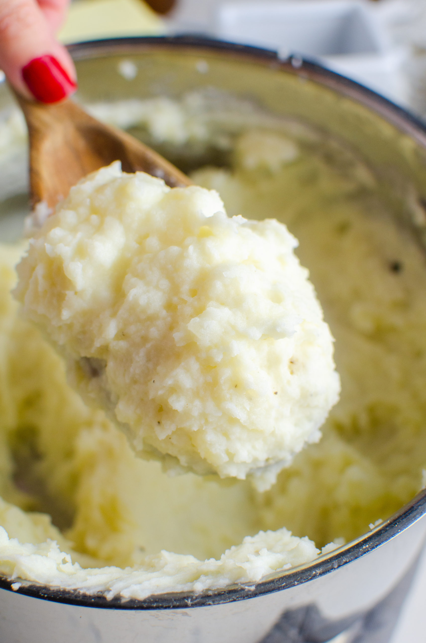 A spoonful of mashed potatoes. 