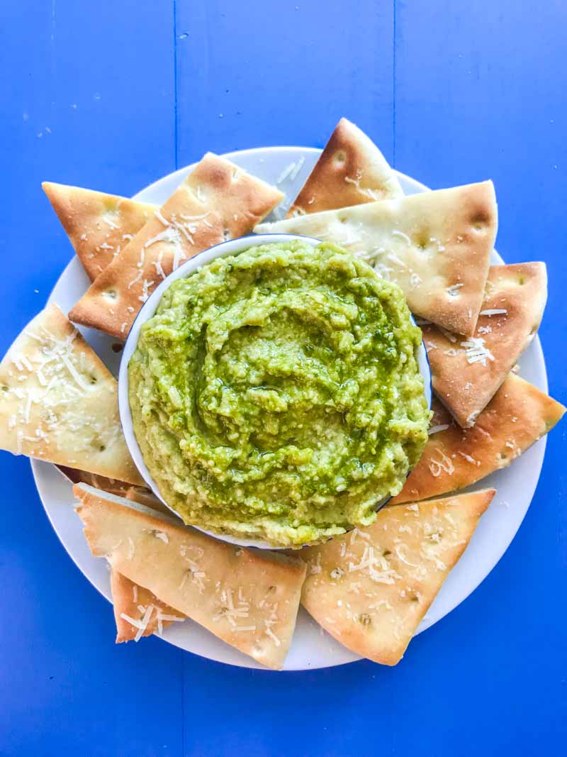 Pesto White Bean Dip gives a burst of summer to this classic Italian dip. It will be the perfect addition to summer parties and picnics. 