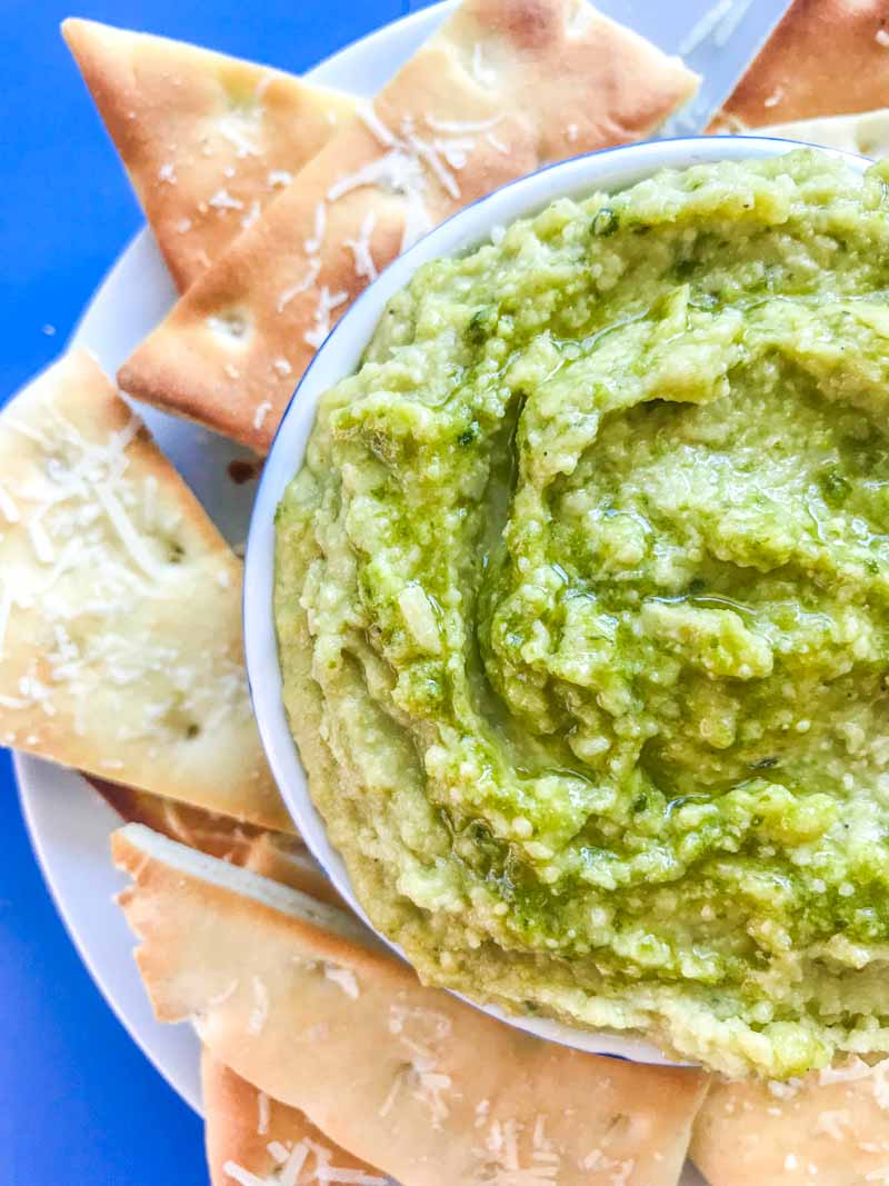 Pesto White Bean Dip gives a burst of summer to this classic Italian dip. It will be the perfect addition to summer parties and picnics. 