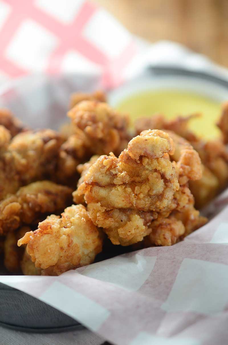 Crispy bite-size popcorn chicken will be a hit with the whole family!