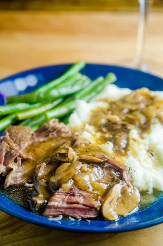 This Pressure Cooker Pot Roast is tender, fall apart, beefy goodness. It even makes it's own gravy! AND it's easy and quick enough to make any day of the week. 