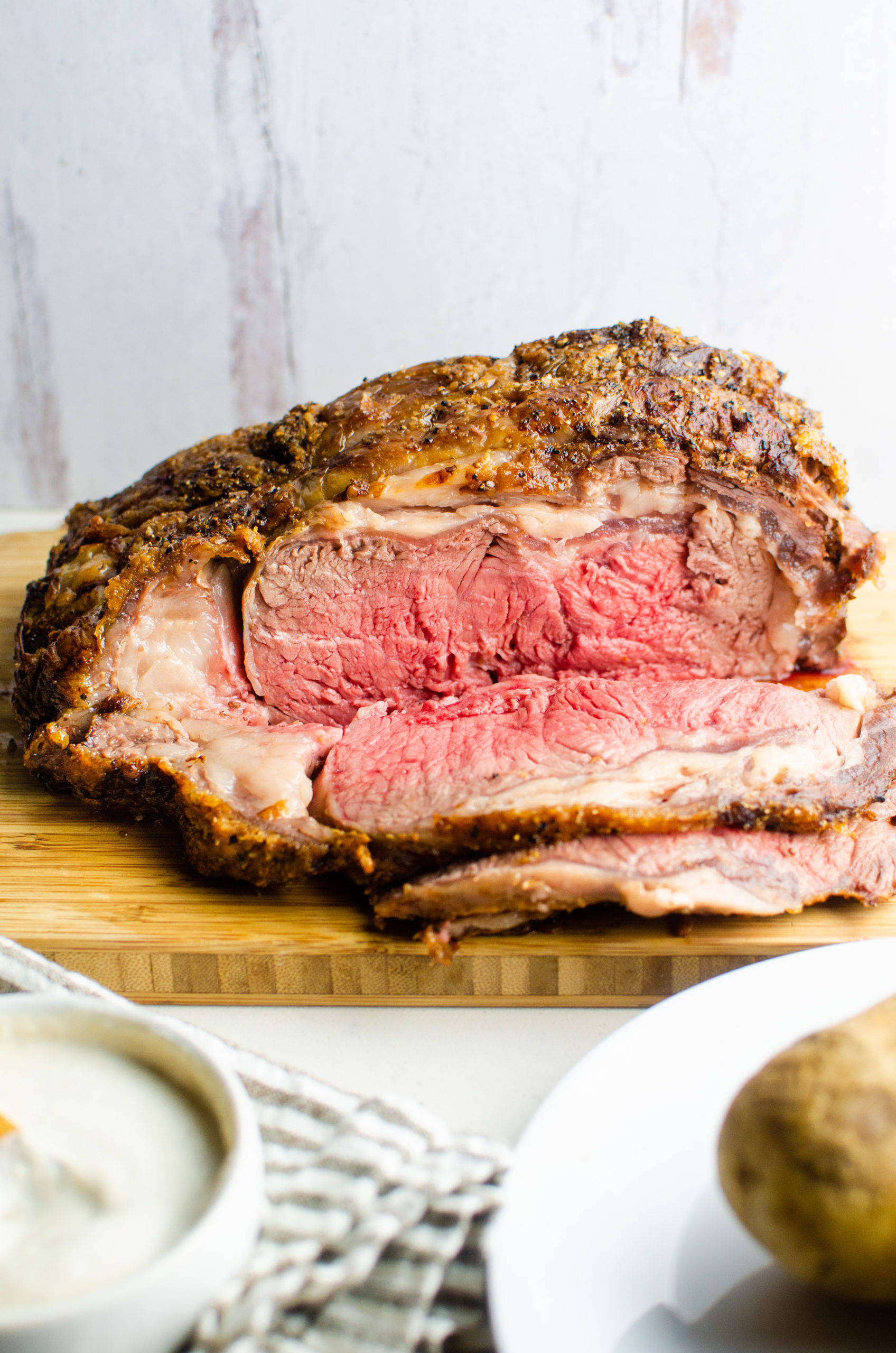 Holiday prime rib roast on a cutting board. 