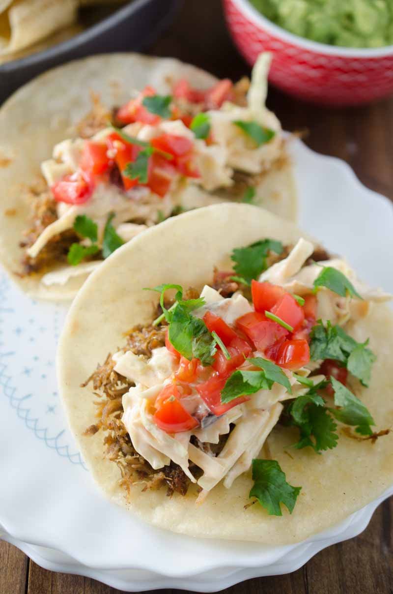 These Pulled Pork Tacos with Chipotle Slaw are packed full of flavor and a great addition to your Taco Tuesday! 