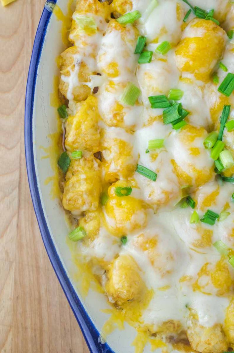 Quick and easy Pulled Pork Tater Tot Casserole is loaded with baked beans, pulled pork and two cheeses. This casserole is perfect for busy weeknights.