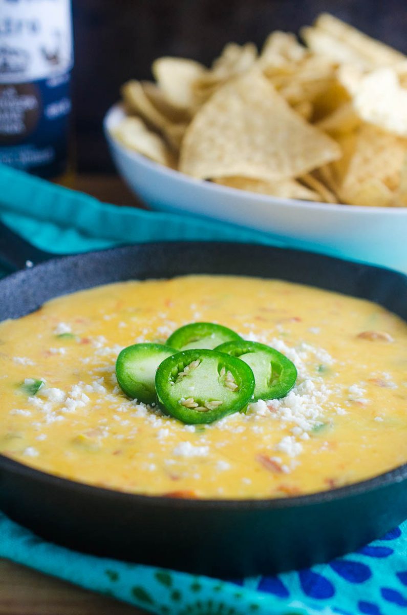 Queso Dip with Three Cheeses is a must for all of your tailgating, parties, summer BBQs. With Velveeta, pepper jack and cojita it's a creamy, cheese dip sure to be a hit