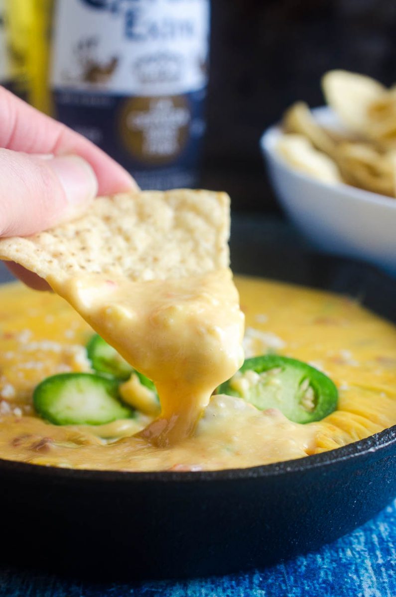 Queso Dip with Three Cheeses is a must for all of your tailgating, parties, summer BBQs. With Velveeta, pepper jack and cojita it's a creamy, cheese dip sure to be a hit