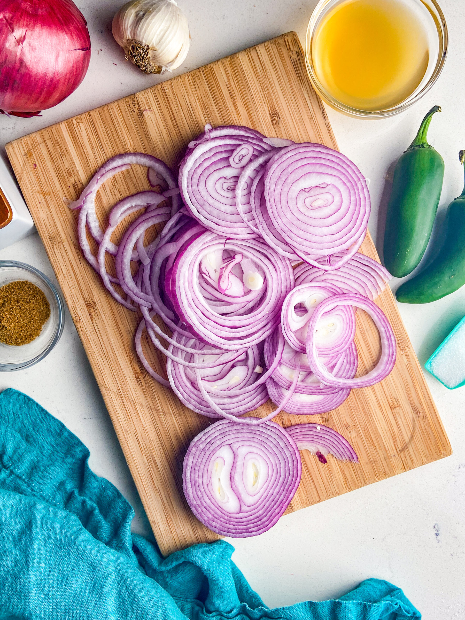 Overhead photo of ingredients needed to make pickled onions. 