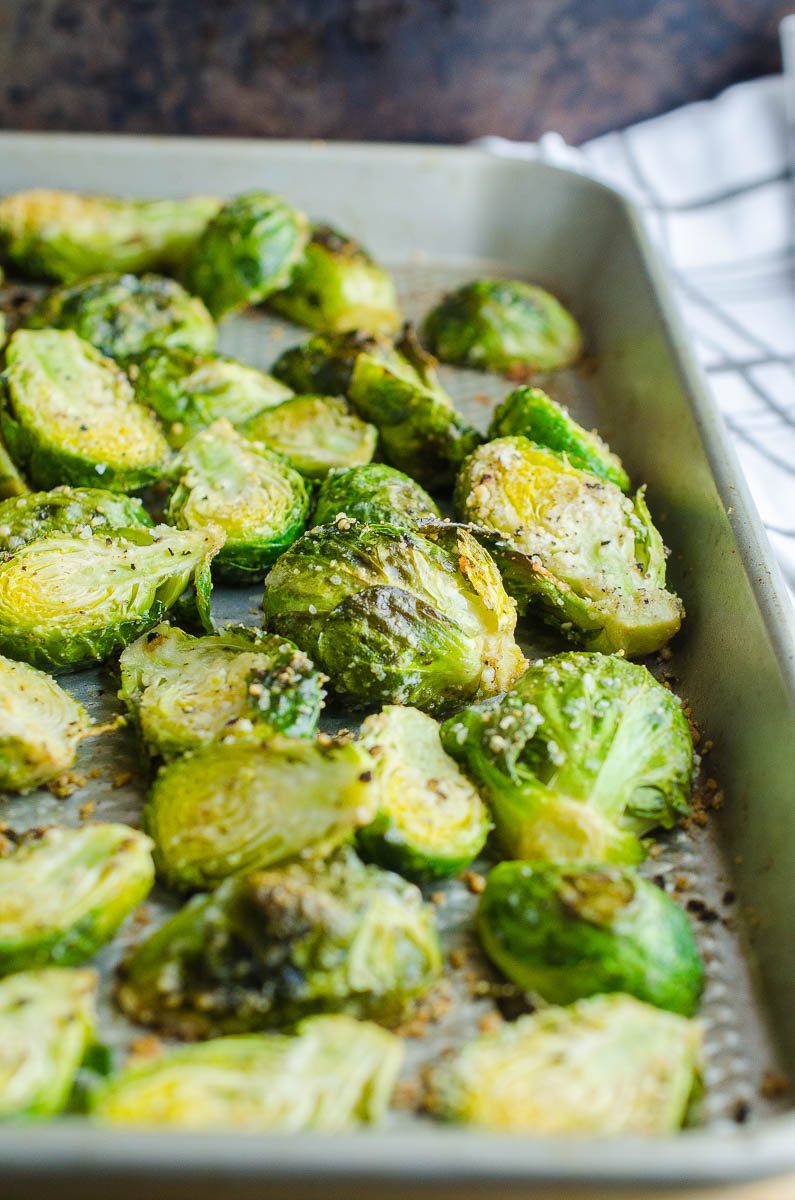 Easy roasted brussel sprouts on baking sheet.