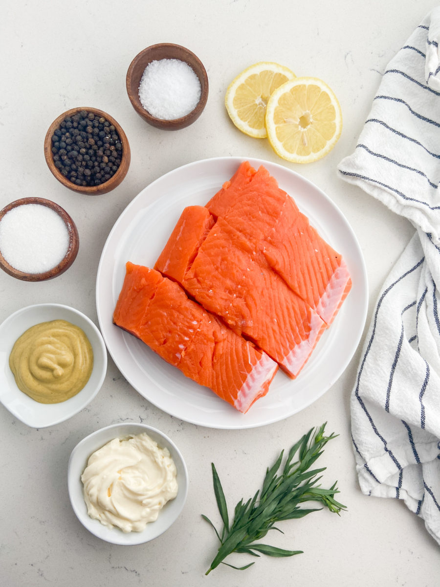 Overhead photo of ingredients needed to make salmon with tarragon sauce. 