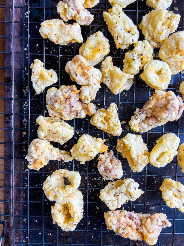 Fried calamari on a cooling rack 