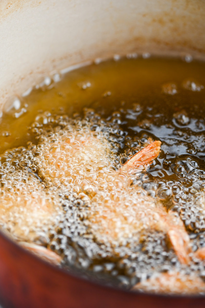 Frying shrimp in oil. 