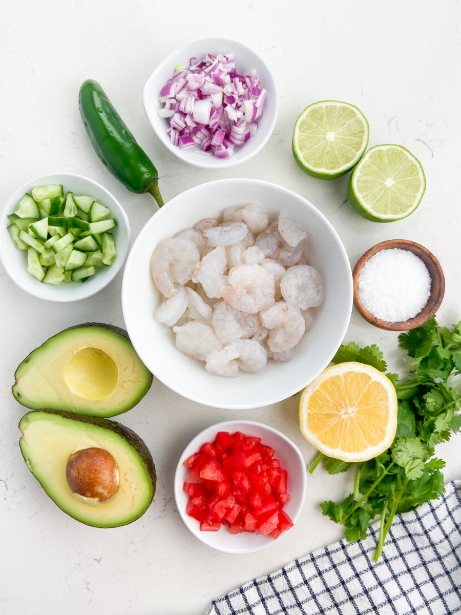 Overhead photo of shrimp ceviche ingredients with white background. 