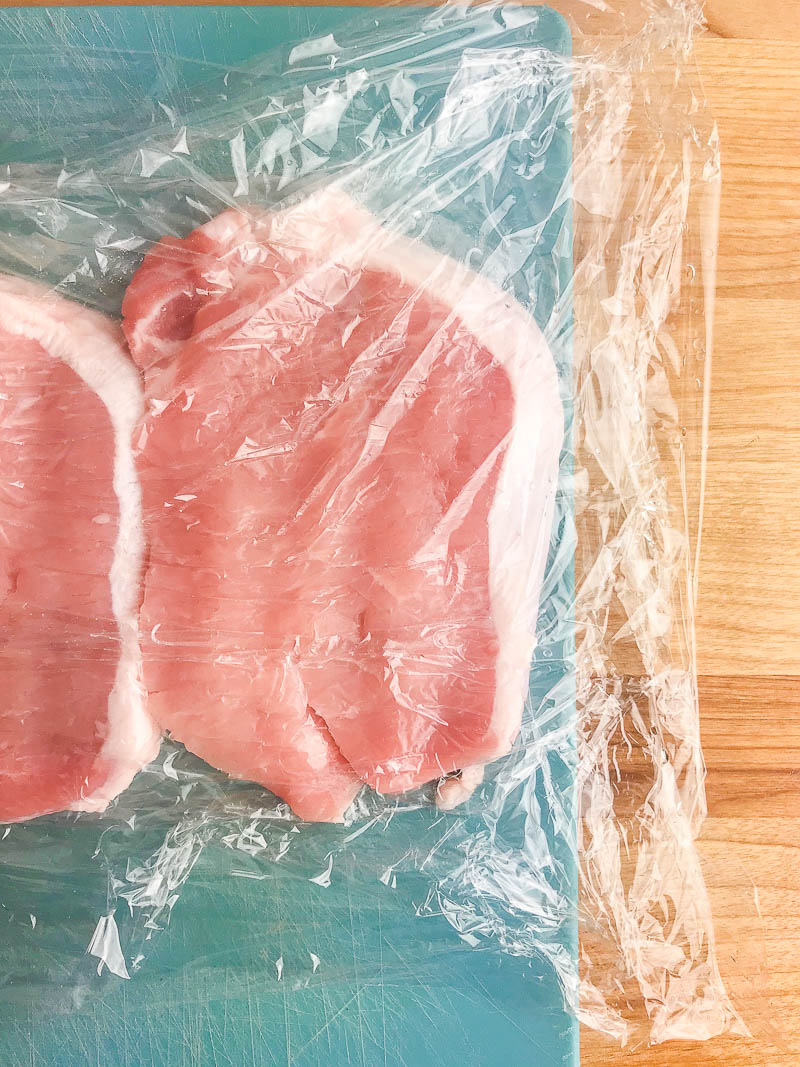 Pro tip: Placing pork chops between two pieces of plastic wrap (or wax paper) helps keep things clean when tenderizing. 