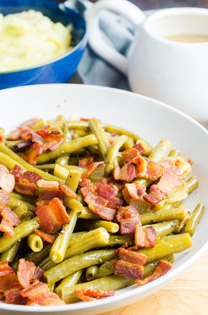 Southern style green beans with bacon in a serving dish. 