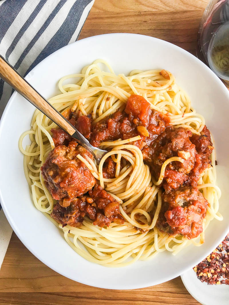 Overhead picture of spaghetti and meatballs. 