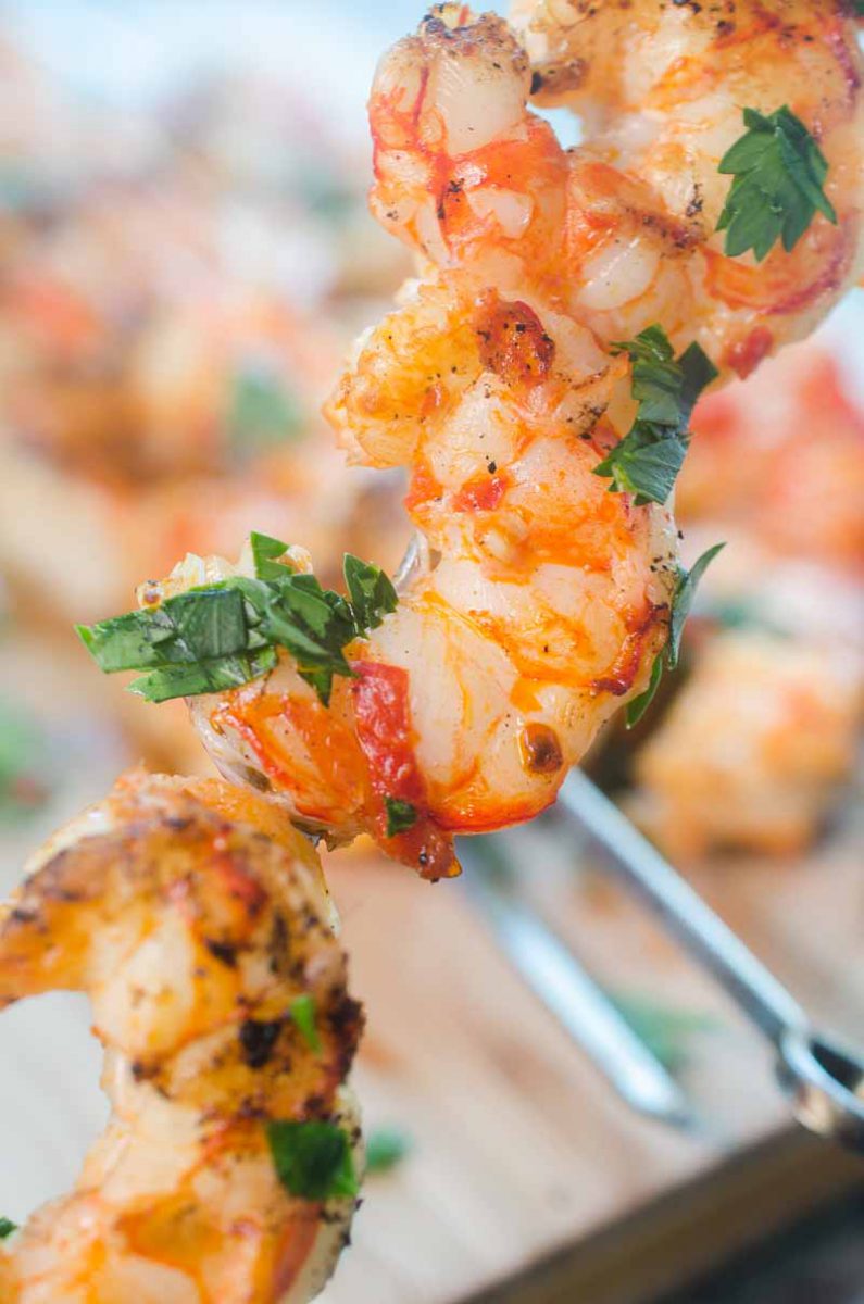 Spicy Grilled Shrimp is the perfect recipe to add a little kick to your next BBQ. With only 3 ingredients and less than 10 minutes on the grill, they are ready in a flash too! 