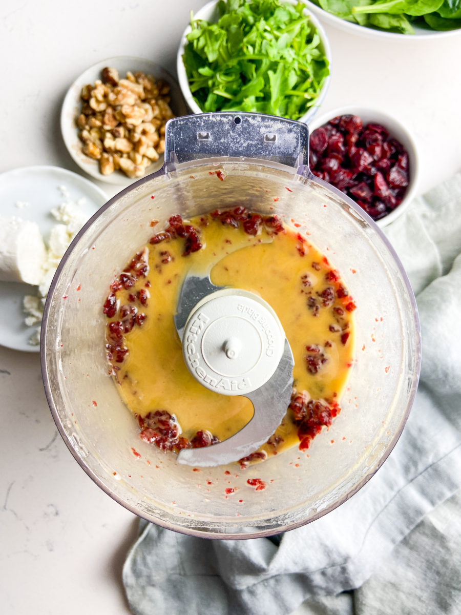 Cranberry vinaigrette in a food processor.