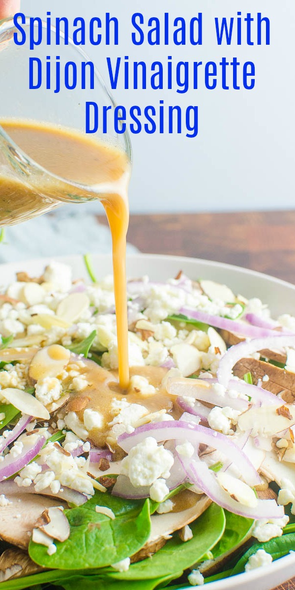 Spinach Salad with mushrooms, goat cheese, red onions and THE BEST spinach salad dressing. #salad #spinach #saladdressing