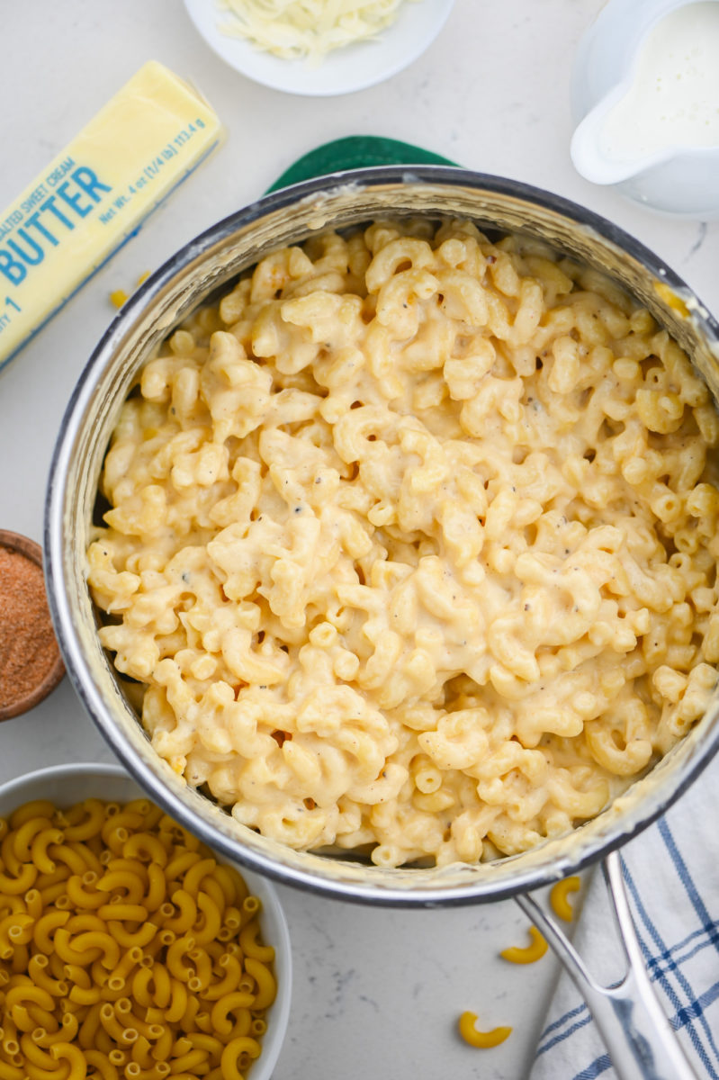 Stovetop mac and cheese in stainless steel pot. 