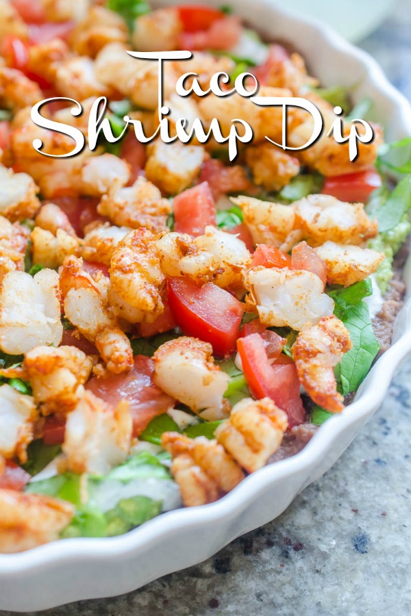 Everyone one loves a good shrimp taco. Everyone loves a good taco dip. I've put them together in this Taco Shrimp Dip with black beans, lettuce, cilantro sour cream, tomatoes and spicy shrimp. The Best Cold Shrimp dip! #tacodip #shrimpdip #shrimptacos #shrimptaco #seafood 