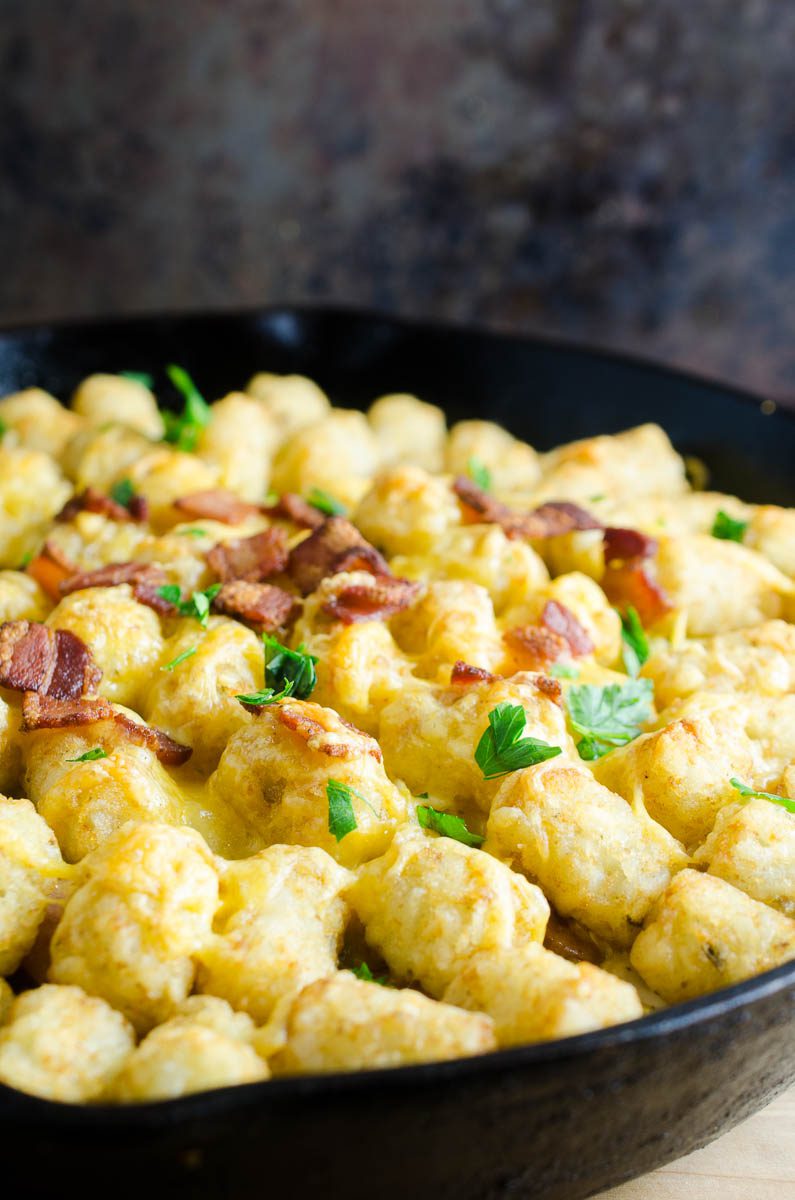 Kielbasa and Cabbage Tater Tot Casserole is comfort food of epic proportions. Sautéed cabbage and kielbasa topped with cheddar cheese and tater tots, then baked until crisp. 