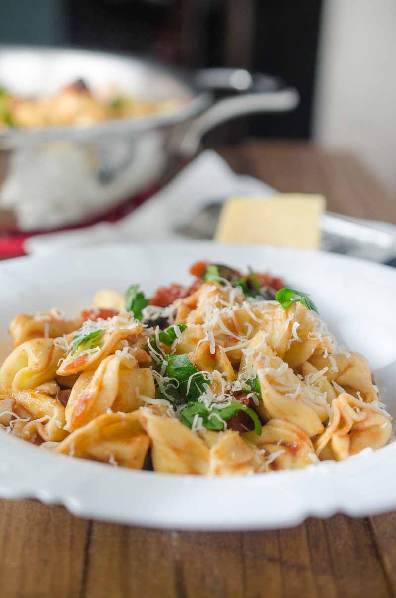 Tortellini Puttanesca is loaded with tomatoes, olives, capers, garlic and red wine. It is a family hit that will make weeknight dinners a breeze!