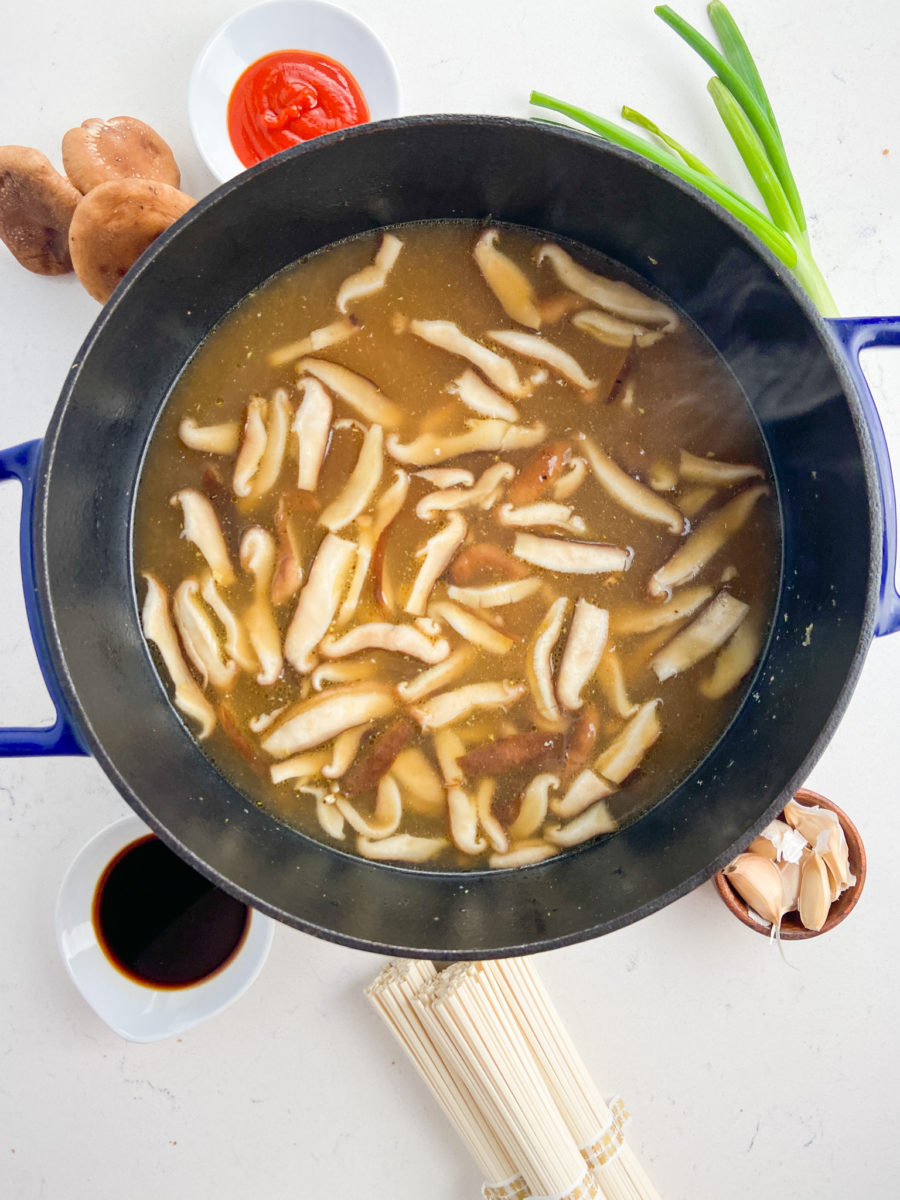 Mushroom broth in a pot. 