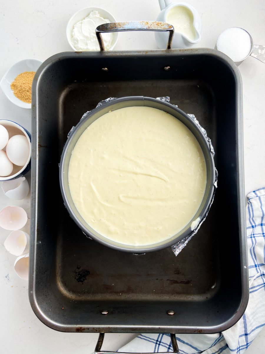 Vanilla Bean cheesecake in roasting pan. 