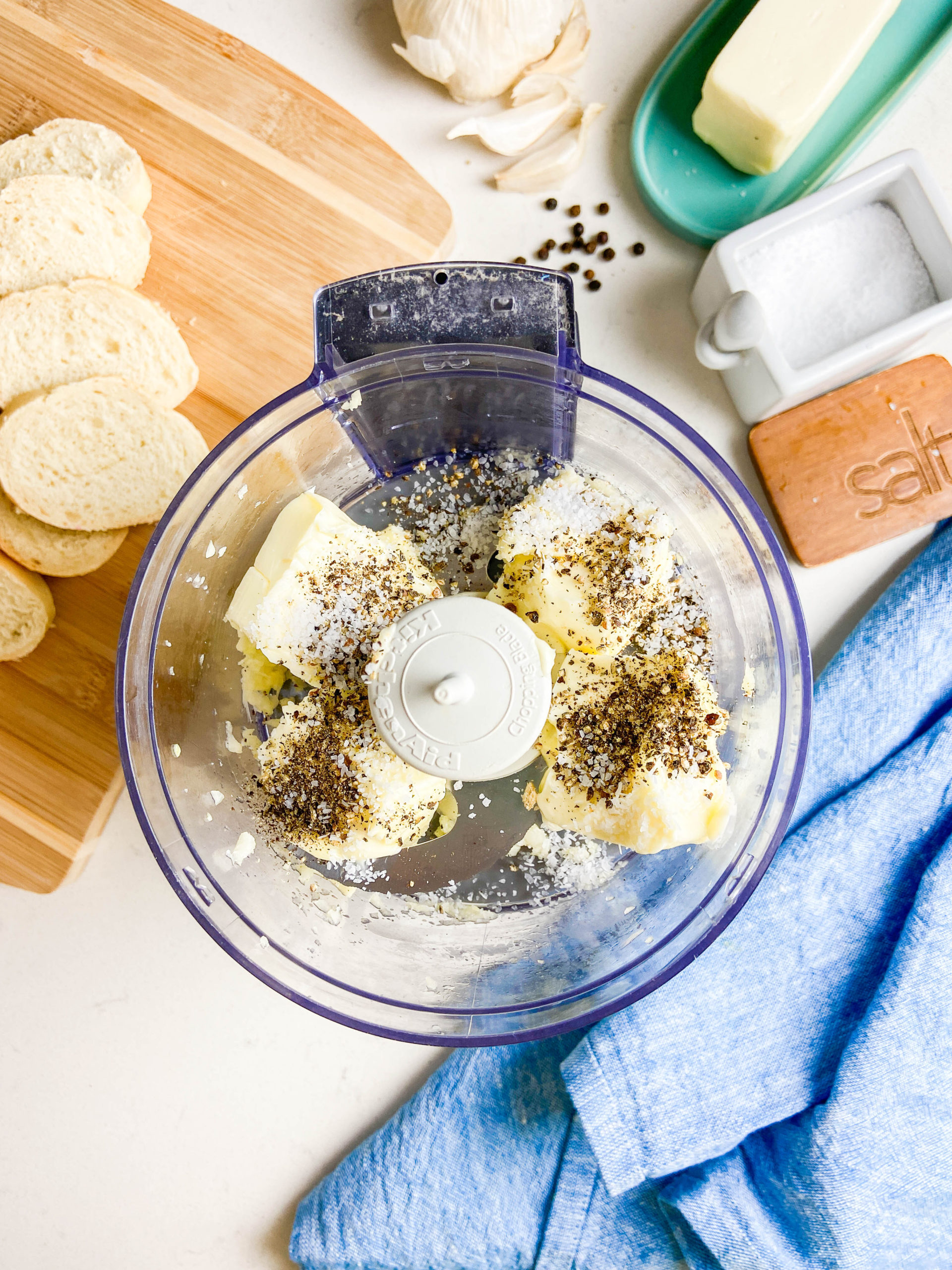 Ingredients for whipped butter in a food processor. 