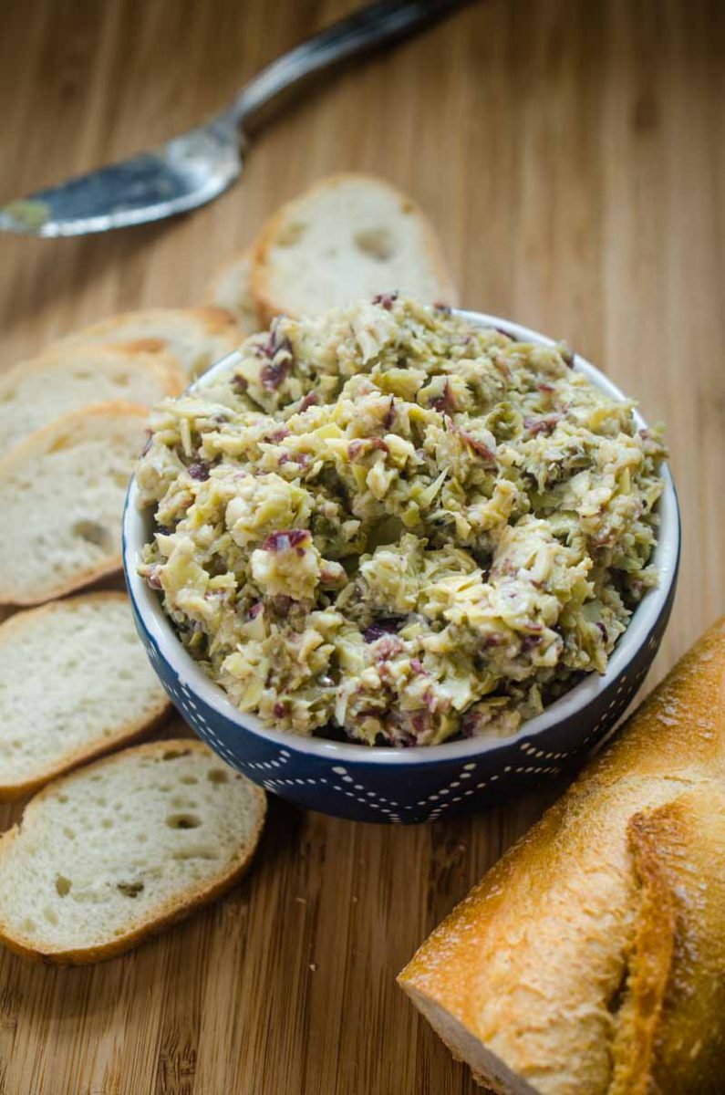 Easy Artichoke Tapenade is the perfect spread for breads, to add to sandwiches and is a must for cheese boards. Make it for your next party! 