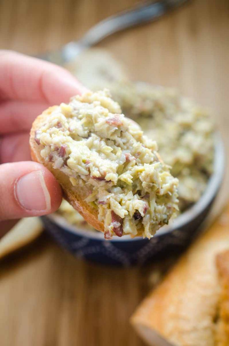 Easy Artichoke Tapenade is the perfect spread for breads, to add to sandwiches and is a must for cheese boards. Make it for your next party! 