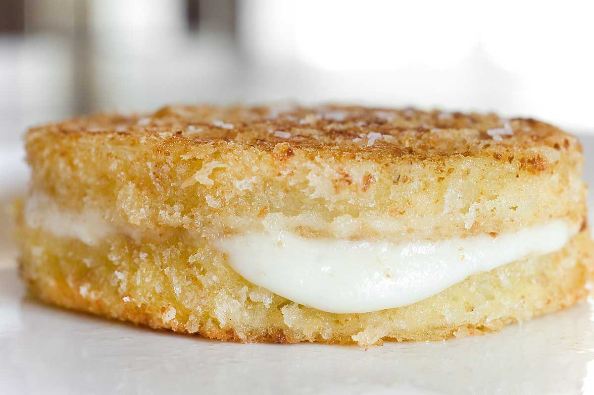 Oooey, gooey mozzarella sandwiched between two crispy, crunchy fried green tomatoes. 