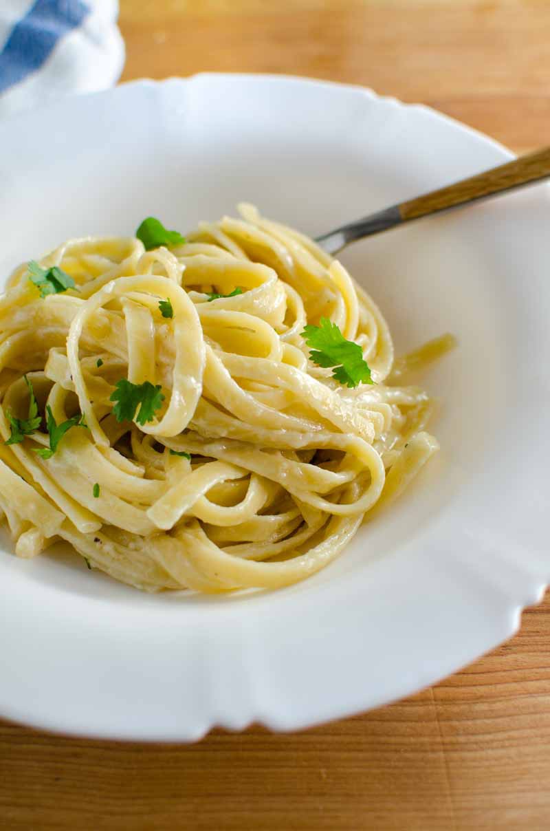 This rich and decadent Roasted Garlic Fettuccine Alfredo is loaded with cream, butter and sweet roasted garlic. 